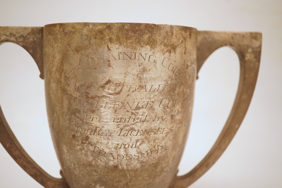 An Art Deco silver two handled presentation trophy cup, with engraved inscription, Adie Bros. Birmingham, 1928, height 17.4cm, 21oz.
